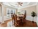 Dining room with hardwood floors, chair rail, and crown molding at 3648 Ramsey Close Sw, Atlanta, GA 30331