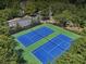 Aerial view of two well-maintained tennis courts at 3648 Ramsey Close Sw, Atlanta, GA 30331