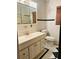 Bathroom with white vanity, toilet and tiled floor at 4350 Rockdale Dr, Acworth, GA 30101