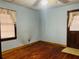 Bright bedroom with hardwood floors and ceiling fan at 4350 Rockdale Dr, Acworth, GA 30101