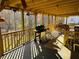 Spacious screened porch with grill and seating at 4350 Rockdale Dr, Acworth, GA 30101