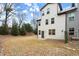 Townhouse backyard with patio and grass at 8775 Village Pl, Suwanee, GA 30024