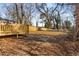 Large backyard with mature trees and a deck at 942 Lawton Sw St, Atlanta, GA 30310