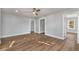 Spacious living area with hardwood floors and an open floor plan at 942 Lawton Sw St, Atlanta, GA 30310