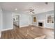 Spacious living room with hardwood floors and fireplace at 942 Lawton Sw St, Atlanta, GA 30310