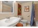 Clean bathroom with a shower/tub combo and white vanity at 2002 Lake Lucerne Sw Dr, Lilburn, GA 30047