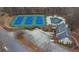 Aerial view of community tennis courts, pool, and clubhouse at 2751 Maeve Ct, Dacula, GA 30019