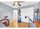 Light and airy bedroom with wood floors and built-in shelving at 510 Firethorn Ct, Villa Rica, GA 30180