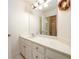 Bathroom with corner vanity and large mirror at 2057 Chambord Way, Snellville, GA 30078