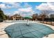 Community pool with a mushroom fountain and plenty of lounge chairs at 2057 Chambord Way, Snellville, GA 30078