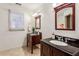 Bathroom with double vanity and dark wood cabinets at 2590 Knox Ne St, Atlanta, GA 30317