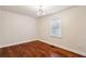 Bright bedroom with hardwood floors and neutral walls at 2590 Knox Ne St, Atlanta, GA 30317