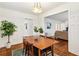 Open concept dining room with hardwood floors and view of living room at 2590 Knox Ne St, Atlanta, GA 30317