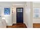 Inviting entryway with blue door and hardwood floors at 2590 Knox Ne St, Atlanta, GA 30317