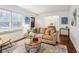 Living room with hardwood floors, neutral decor and open floor plan at 2590 Knox Ne St, Atlanta, GA 30317