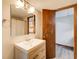 Basement bathroom with vanity and shower/tub combo at 9385 N Lake Dr, Roswell, GA 30076