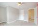 Well-lit bedroom with ceiling fan and ample closet space at 9385 N Lake Dr, Roswell, GA 30076