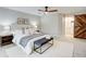 Main bedroom with ensuite bathroom and barn door at 9385 N Lake Dr, Roswell, GA 30076