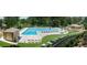 Resort-style pool with plenty of lounge chairs at 9385 N Lake Dr, Roswell, GA 30076