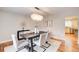 Modern dining room with hardwood floors and a chandelier at 9385 N Lake Dr, Roswell, GA 30076