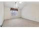 Bedroom with vaulted ceiling, skylight, and ceiling fan at 1003 Somerton Pl, Cumming, GA 30040