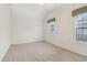 Bright bedroom with neutral walls and carpet flooring at 1003 Somerton Pl, Cumming, GA 30040