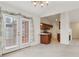 Dining room with kitchen access and view to backyard at 1003 Somerton Pl, Cumming, GA 30040