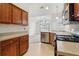 Kitchen with stainless steel appliances and wood cabinets at 1003 Somerton Pl, Cumming, GA 30040