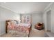 Spacious bedroom with a sitting area and large windows at 1418 Defoors Nw Dr, Atlanta, GA 30318