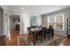 Elegant dining room with hardwood floors and a view of kitchen at 1418 Defoors Nw Dr, Atlanta, GA 30318