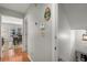 A well-lit hallway with access to other rooms at 1418 Defoors Nw Dr, Atlanta, GA 30318