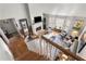 Upstairs view of living room with hardwood floors and fireplace at 1418 Defoors Nw Dr, Atlanta, GA 30318