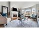 Bright living room featuring a fireplace and ample natural light at 1418 Defoors Nw Dr, Atlanta, GA 30318