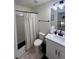 Simple bathroom with shower/tub combo and white vanity at 1887 Plainsboro Dr, Lithonia, GA 30058