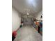 Clean and spacious garage with overhead storage at 1887 Plainsboro Dr, Lithonia, GA 30058