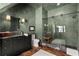 Elegant bathroom with textured walls and walk-in shower at 230 Central Ave, Fayetteville, GA 30214