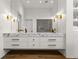 Bathroom with marble-topped vanity and modern lighting at 230 Central Ave, Fayetteville, GA 30214