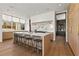 Bright kitchen with marble backsplash and large island at 230 Central Ave, Fayetteville, GA 30214