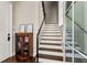 Modern staircase with dark wood and metal railing at 230 Central Ave, Fayetteville, GA 30214