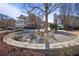 Community firepit surrounded by chairs in a landscaped area at 393 Summerhour St, Marietta, GA 30060