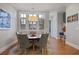 Bright dining room with hardwood floors and a charming wooden table at 393 Summerhour St, Marietta, GA 30060