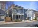 Two-story home with light gray siding, balcony, and two-car garage at 393 Summerhour St, Marietta, GA 30060