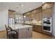 Modern kitchen with stainless steel appliances and granite countertops at 393 Summerhour St, Marietta, GA 30060