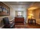 Cozy basement bedroom with wooden sleigh bed and hardwood floors at 5041 Towne Lake N Hls, Woodstock, GA 30189