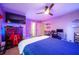 Bright bedroom with a full-size bed and Tom Brady decor at 5041 Towne Lake N Hls, Woodstock, GA 30189