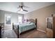 Bedroom with a full-size bed and plenty of natural light at 5041 Towne Lake N Hls, Woodstock, GA 30189