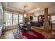 Bright dining room with hardwood floors and a view to the backyard at 5041 Towne Lake N Hls, Woodstock, GA 30189