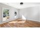 Bright bedroom with hardwood floors and large windows at 1134 Country Ne Ln, Atlanta, GA 30324