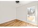 Bright bedroom with hardwood floors and large window at 1134 Country Ne Ln, Atlanta, GA 30324