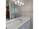 Bathroom with single vanity, mirror and a toilet at 1206 Persimmon Way, Mcdonough, GA 30252